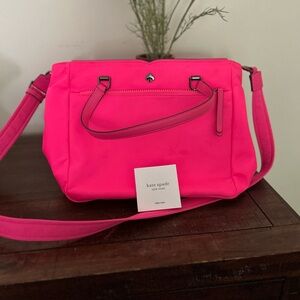 Neon pink Kate spade nylon bag.